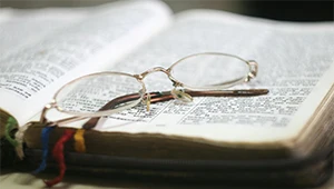 Photo by John-Mark Smith: https://www.pexels.com/photo/eyeglass-with-gold-colored-frames-273936/